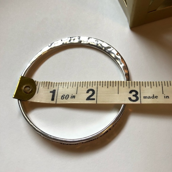 ❗️3/$7 Silver branded bangle - Picture 2 of 4